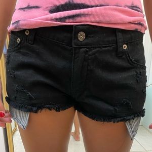 Black Blank NYC Jean shorts with exposed pockets